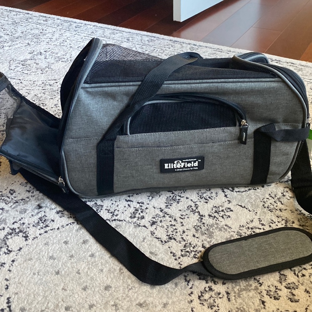 Dog carrier for airplane travel